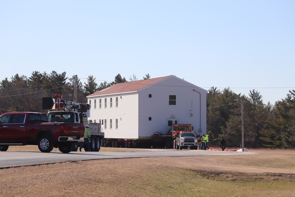 Contractors move fourth World War II-era barracks to new location in April 2023