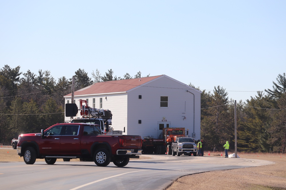 Contractors move fourth World War II-era barracks to new location in April 2023