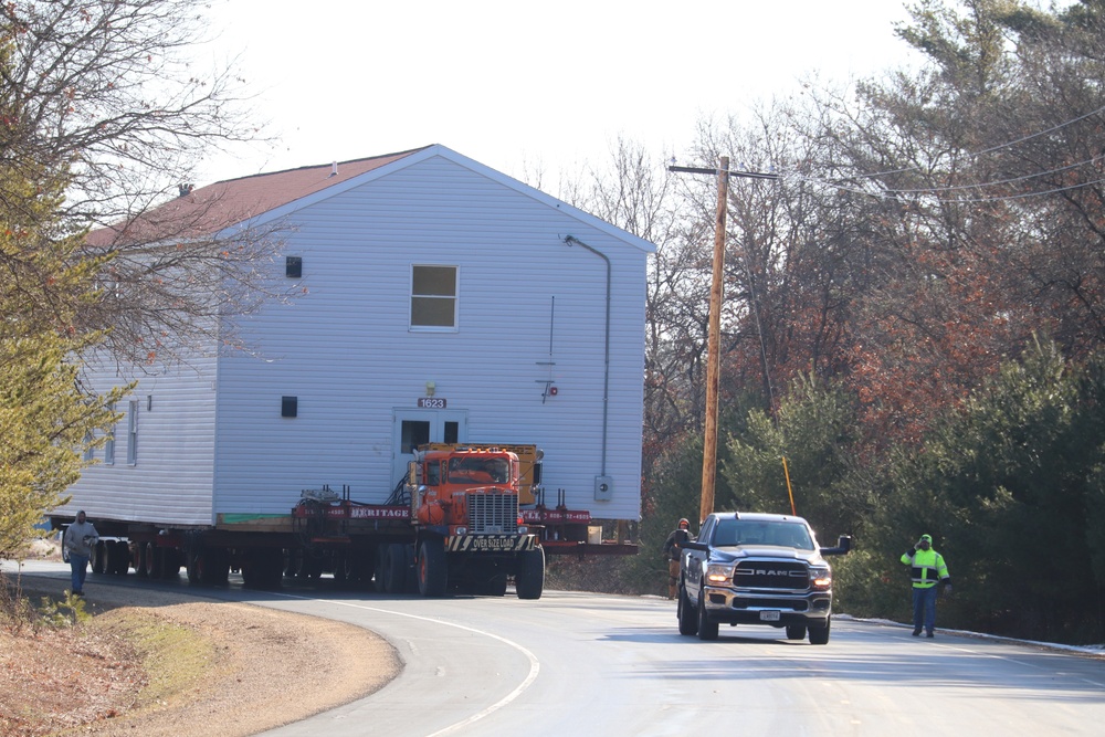 Contractors move fourth World War II-era barracks to new location in April 2023