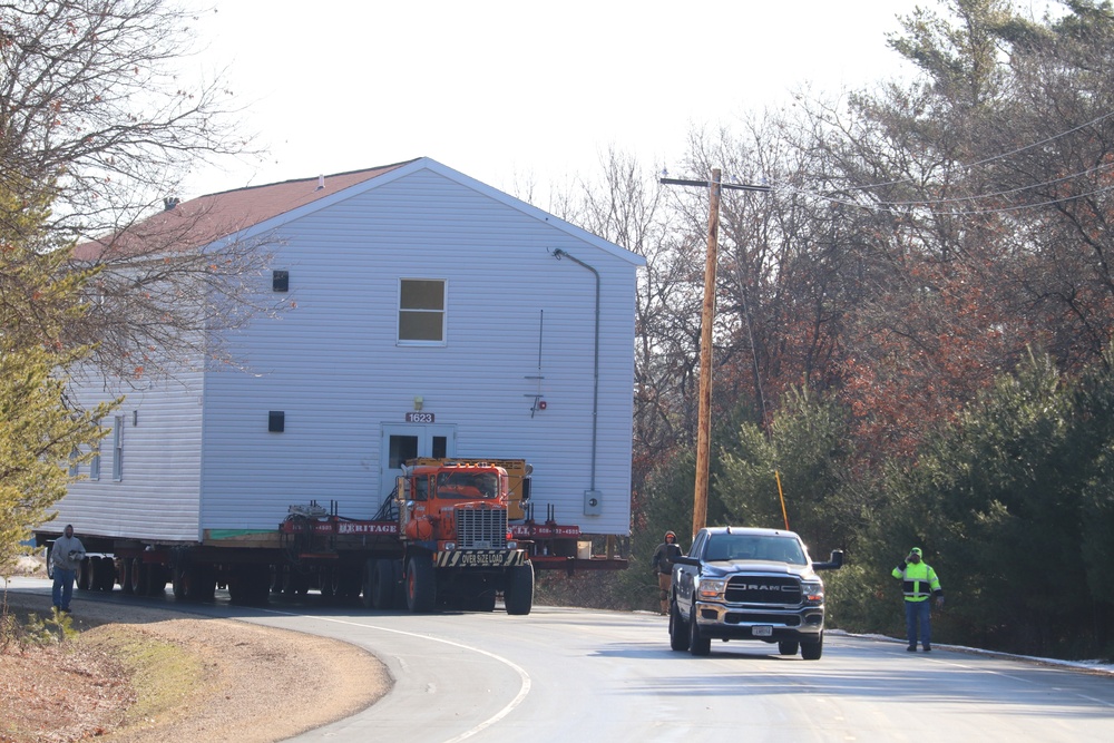 Contractors move fourth World War II-era barracks to new location in April 2023