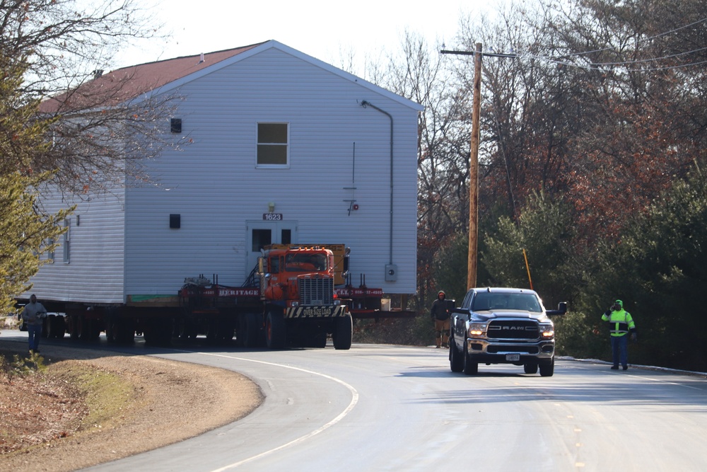 Contractors move fourth World War II-era barracks to new location in April 2023