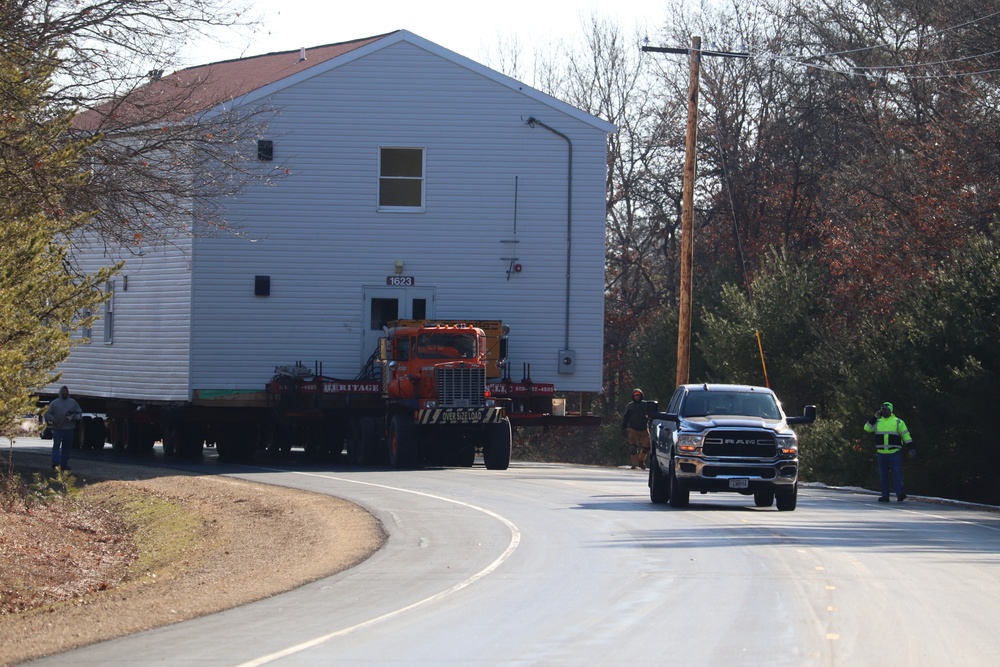 Contractors move fourth World War II-era barracks to new location in April 2023