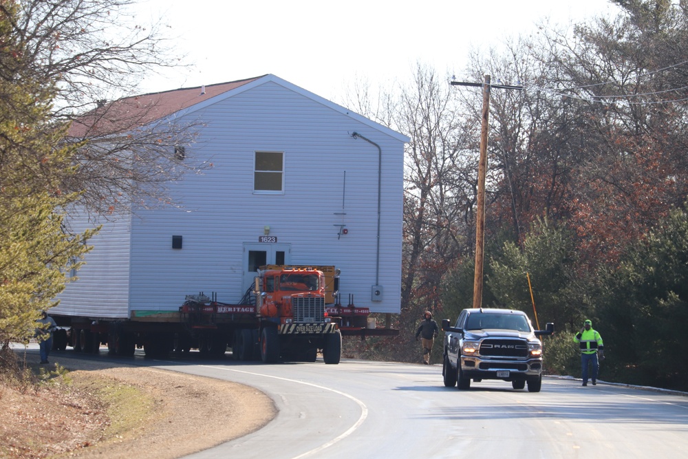 Contractors move fourth World War II-era barracks to new location in April 2023