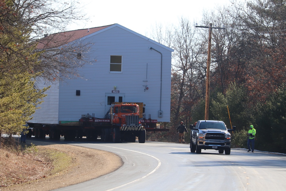 Contractors move fourth World War II-era barracks to new location in April 2023