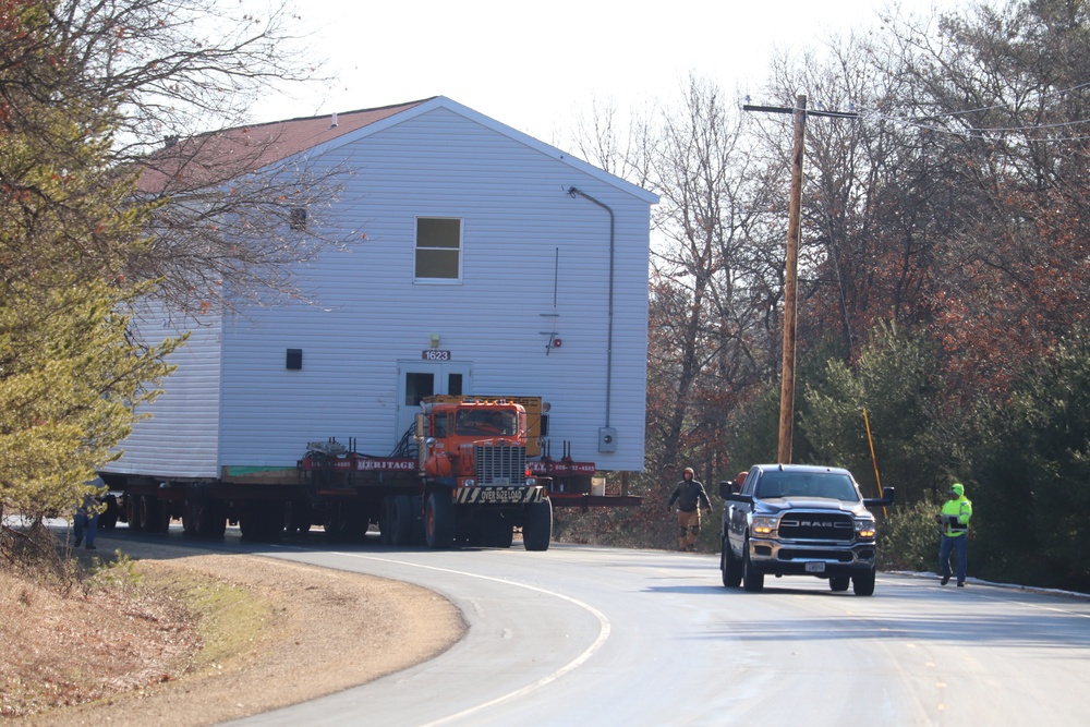 Contractors move fourth World War II-era barracks to new location in April 2023