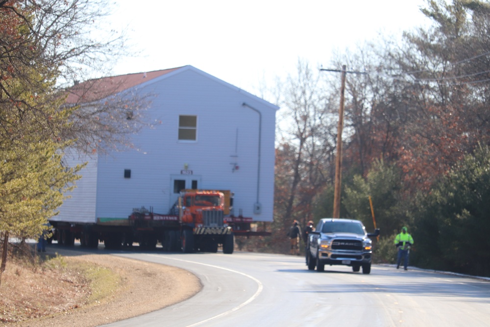 Contractors move fourth World War II-era barracks to new location in April 2023