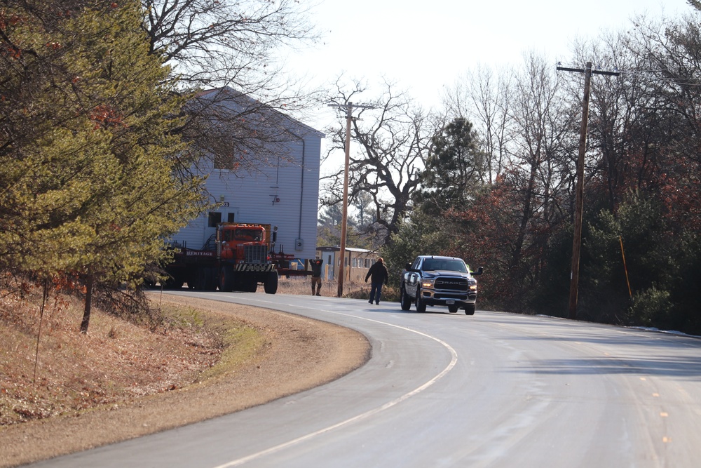 Contractors move fourth World War II-era barracks to new location in April 2023