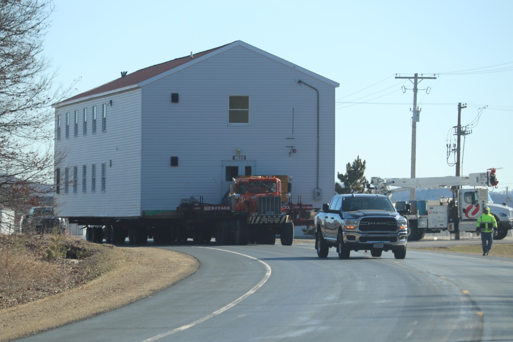 Contractors move fourth World War II-era barracks to new location in April 2023