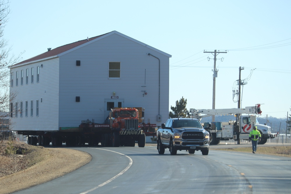 Contractors move fourth World War II-era barracks to new location in April 2023