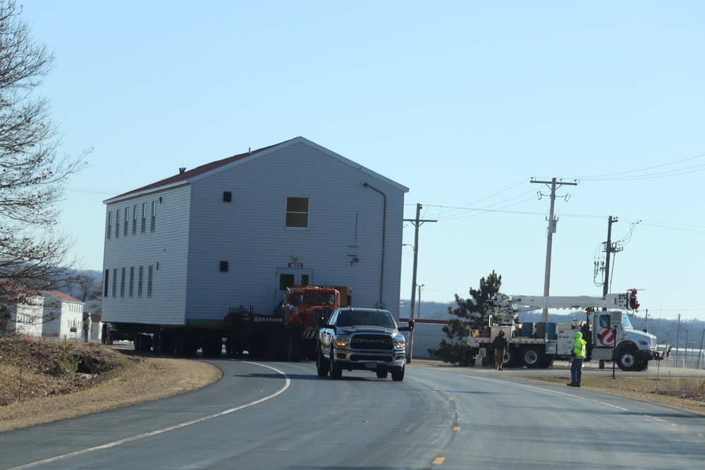 Contractors move fourth World War II-era barracks to new location in April 2023