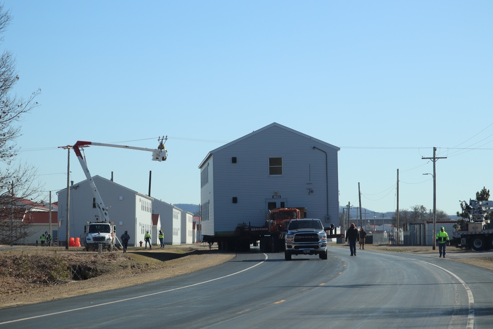 Contractors move fourth World War II-era barracks to new location in April 2023