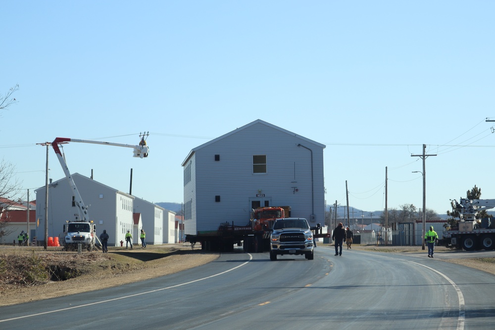 Contractors move fourth World War II-era barracks to new location in April 2023