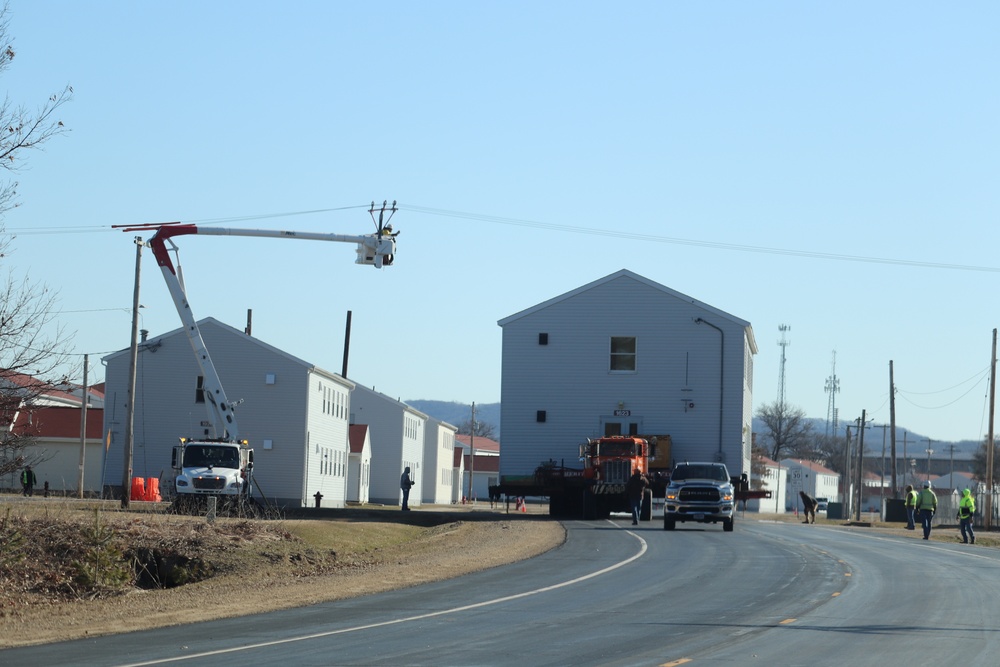 Contractors move fourth World War II-era barracks to new location in April 2023