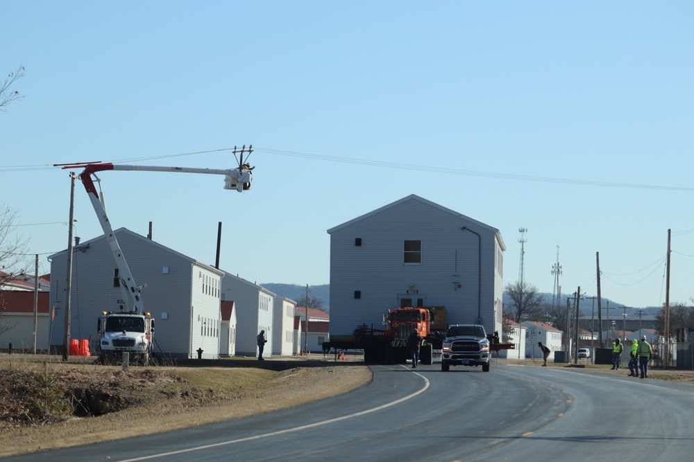 Contractors move fourth World War II-era barracks to new location in April 2023