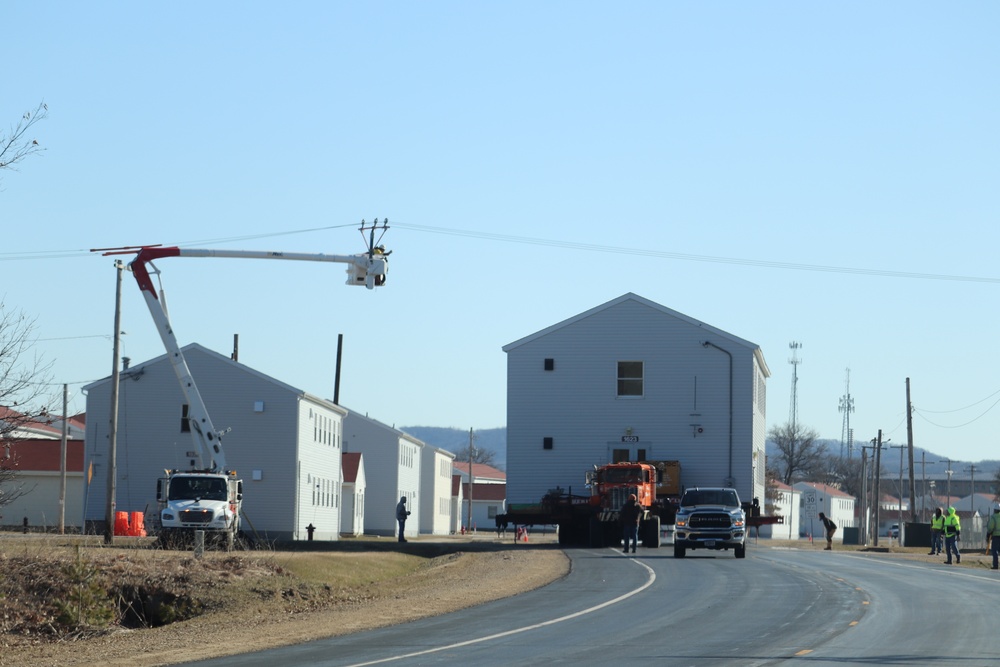 Contractors move fourth World War II-era barracks to new location in April 2023