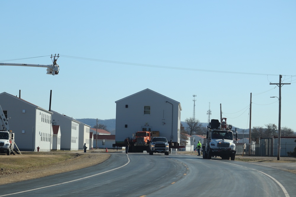 Contractors move fourth World War II-era barracks to new location in April 2023