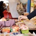 Vendors sell goods in the local market in Tripoli.