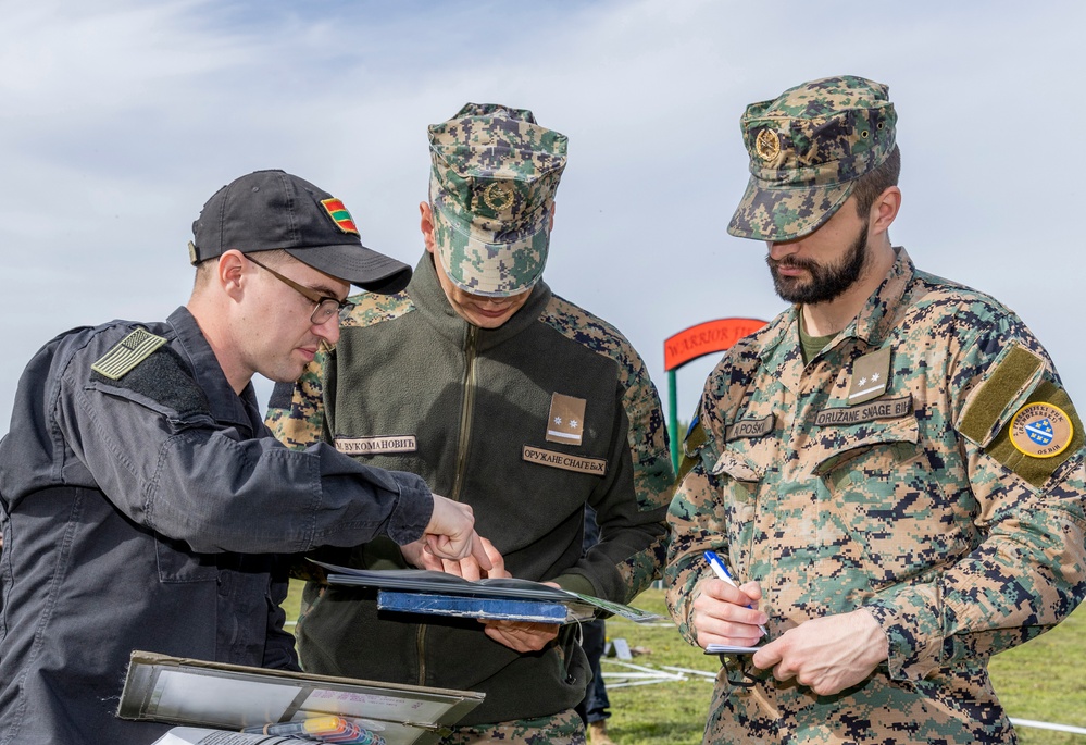 U.S. and multinational soldiers take part in the Combined Arms Rehearsal