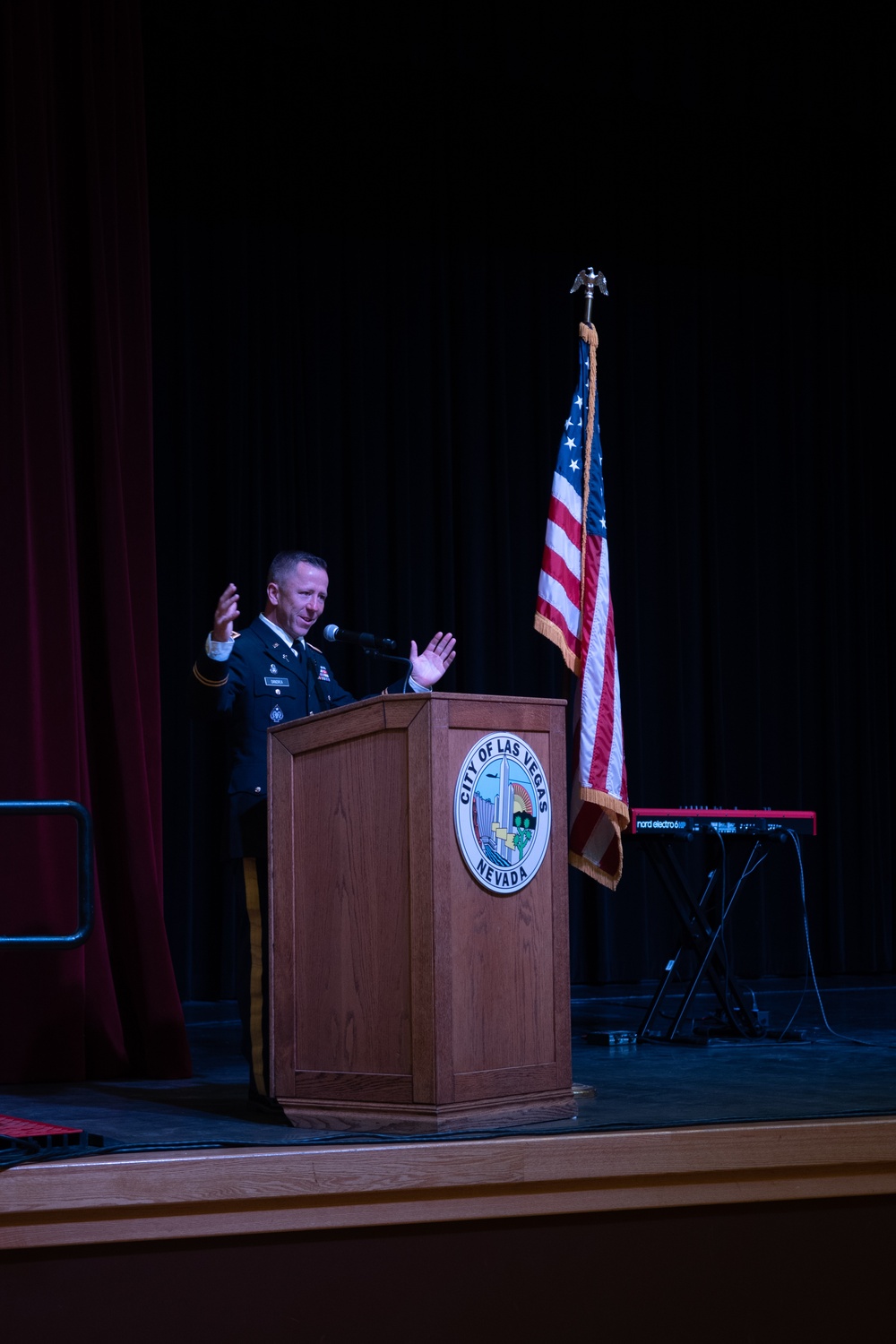 Army Chaplain Maj. Troy Dandrea delivers a prayer during the National Day of Prayer event