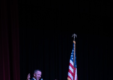 Army Chaplain Maj. Troy Dandrea delivers a prayer during the National Day of Prayer event