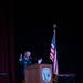 Army Chaplain Maj. Troy Dandrea delivers a prayer during the National Day of Prayer event