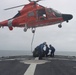 U.S. Coast Guard Cutter Alert, helicopter crews conduct at-sea vertical replenishment training