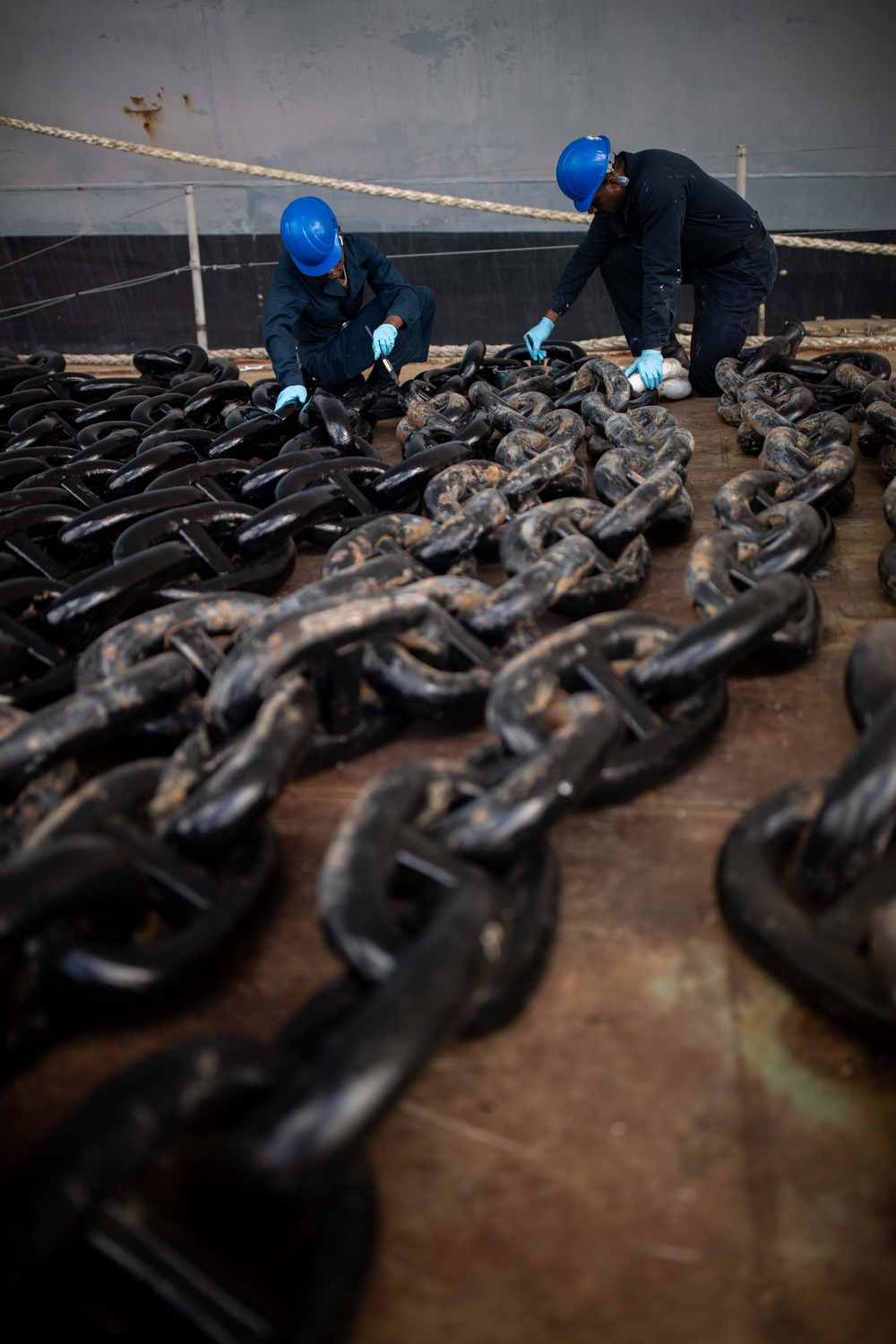 Tripoli Sailors Paint Anchor and Chain During Ongoing SRA