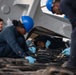 Tripoli Sailors Paint Anchor and Chain During Ongoing SRA