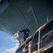 Tripoli Sailors Paint Anchor and Chain During Ongoing SRA