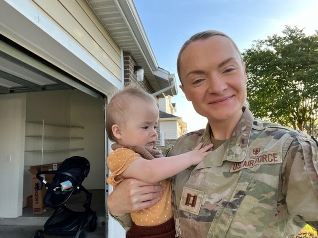 Captain Anastasiya Zemtsova with son