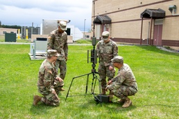 Soldiers from 10th Mountain Division prepare an emitter in preparation for the Hunter EMS training event May 1, 2023, on Fort Drum, NY.