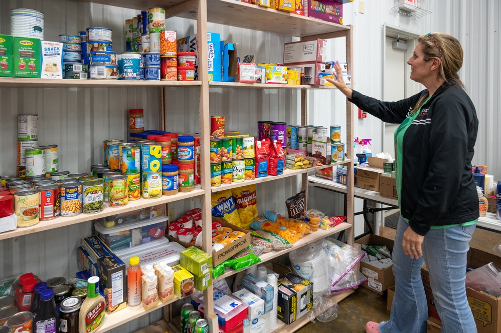 Volunteer Sorts Generous Donations for Tornado Survivors