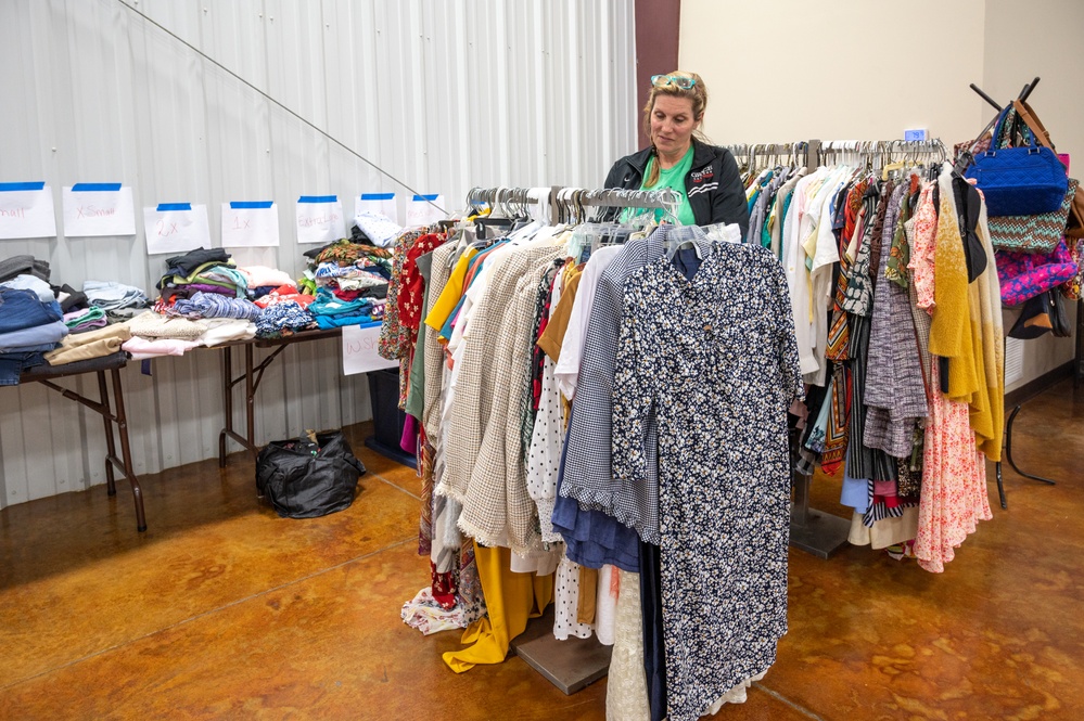 Volunteer Sorts Generous Donations for Tornado Survivors