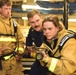 USCGC Eagle crew members conduct emergency onboard fire evolution