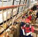 USCGC Eagle crew members conduct emergency onboard fire evolution