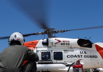 VMGR-252 conducts ground refueling on a U.S. Coast Guard HH-60 Jayhawk