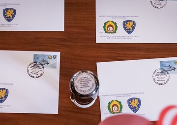 Latvia honors Michigan National Guard partnership’s past, future with national postage stamp