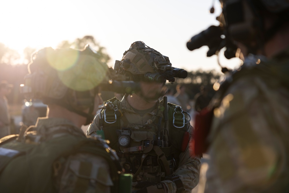 Marine Raiders conduct freefall jump operations