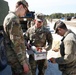 1-182FA Chaplain hands out care packages delivered by Operation Gratitude
