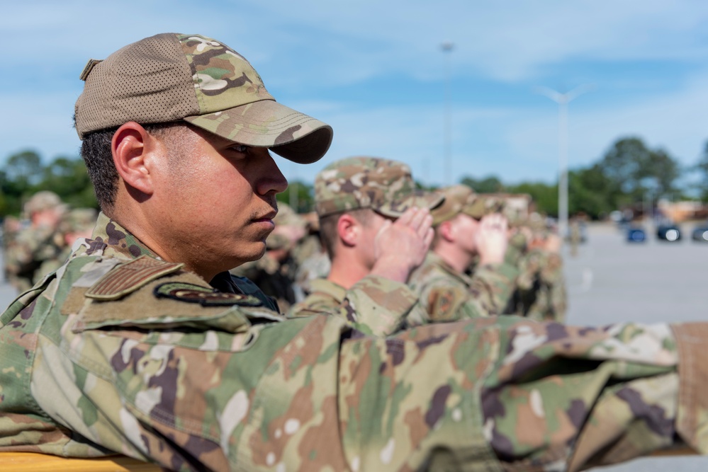 Staff Sgt. Felicia R. Rivers Airman Leadership School Class 23-D participate in retreat ceremony