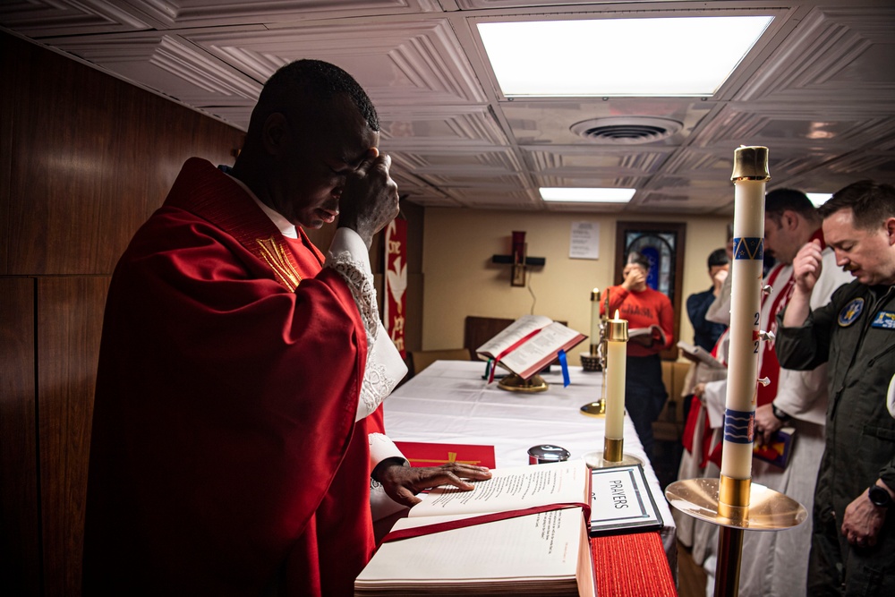 Sailors Participate In A Roman Catholic Church Service