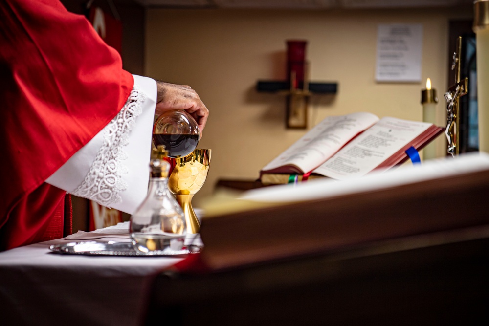 Sailors Participate In A Roman Catholic Church Service