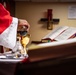 Sailors Participate In A Roman Catholic Church Service