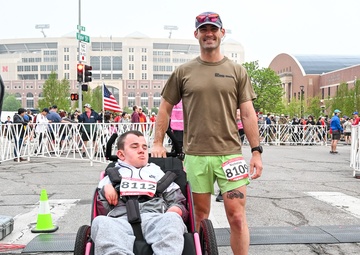 Nick and Sam: Kansas Army National Guard Soldier makes All Guard Marathon Team while pushing best friend to the finish