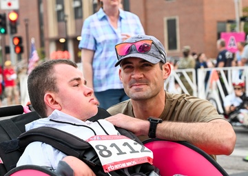 Nick and Sam: Kansas Army National Guard Soldier makes All Guard Marathon Team while pushing best friend to the finish