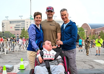Nick and Sam: Kansas Army National Guard Soldier makes All Guard Marathon Team while pushing best friend to the finish