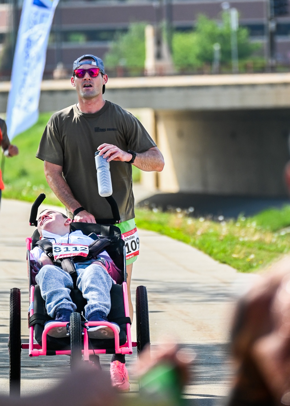 Nick and Sam: Kansas Army National Guard Soldier makes All Guard Marathon Team while pushing best friend to the finish