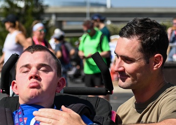 Nick and Sam: Kansas Army National Guard Soldier makes All Guard Marathon Team while pushing best friend to the finish