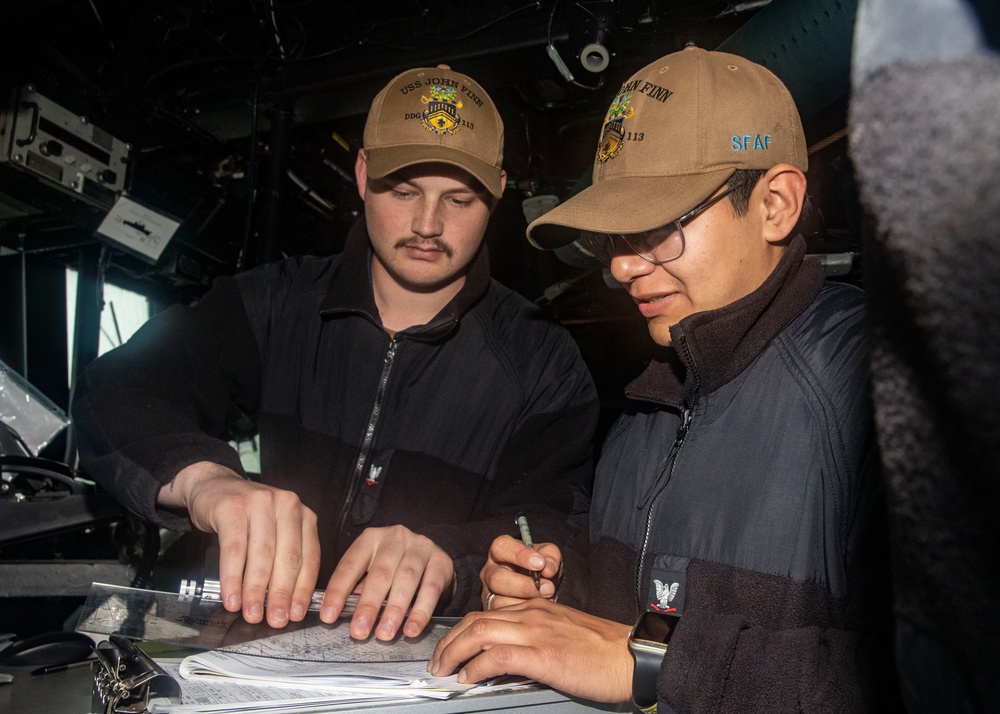 Sailors Stand Watch on the Bridge of USS John Finn (DDG 113)