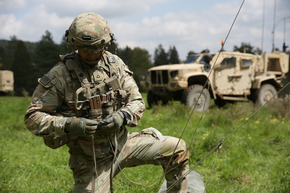 U.S. Soldier sets up communication lines